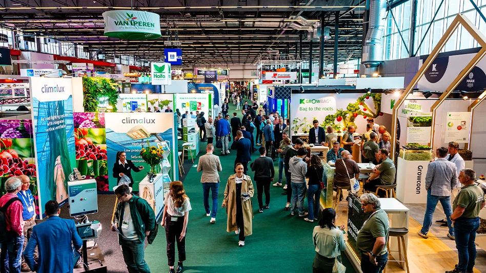 Attendees walk around the trade show floor of a past GreenTech Amsterdam conference.